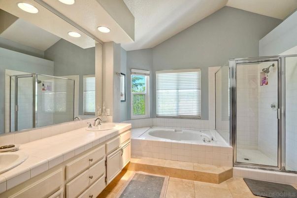 Bathroom, Dual Sink Vanities, Glass Shower, Interior, Recessed Lighting, Tile Countertops