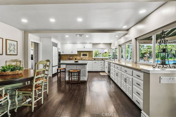 Dining room, Interior, Kitchen, Recessed Lighting, Stainless Steel Appliances, Wood Texture Flooring