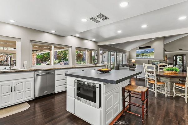 Dining room, Interior, Kitchen, Recessed Lighting, Stainless Steel Appliances, Wood Texture Flooring