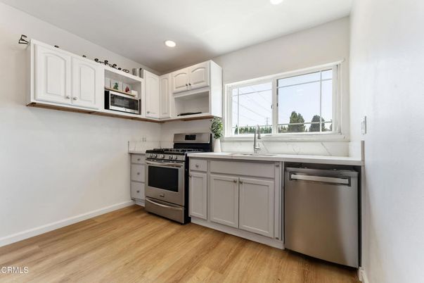 Interior, Kitchen, Recessed Lighting, Stainless Steel Appliances, Wood Texture Flooring
