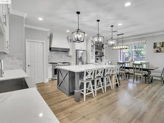 Dining room, Interior, Kitchen, Pendant Lights, Recessed Lighting, Stainless Steel Appliances, Wood Texture Flooring
