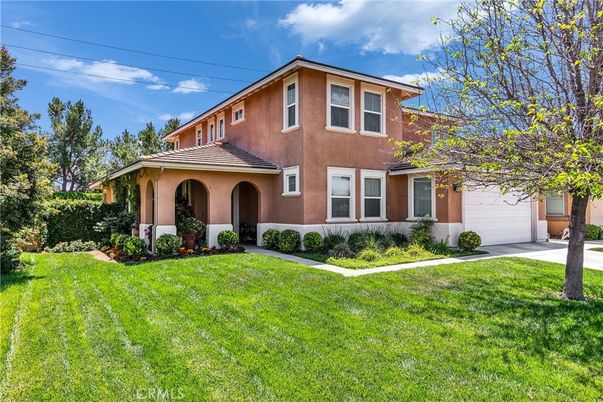 Attached, Backyard, Exterior, Facade, Brick Facade, Mediterranean