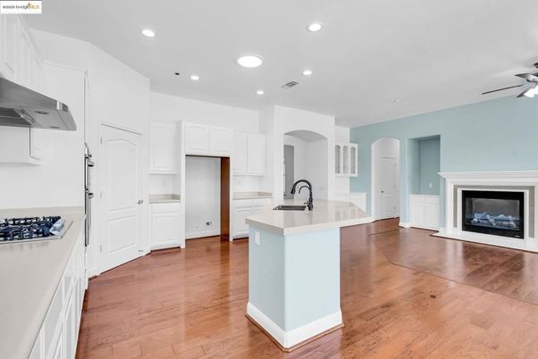 Fireplace, Interior, Kitchen, Recessed Lighting, Wood Texture Flooring