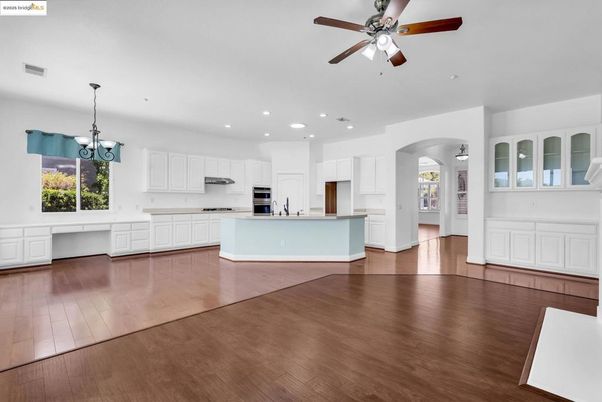 Chandelier, Interior, Kitchen, Pendant Lights, Recessed Lighting, Stainless Steel Appliances, Wood Texture Flooring