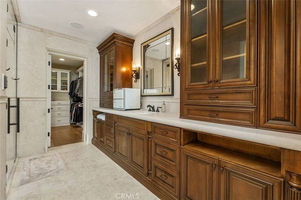 Bathroom, Dual Sink Vanities, Interior, Recessed Lighting, Walk-in Closets, Wood Texture Flooring