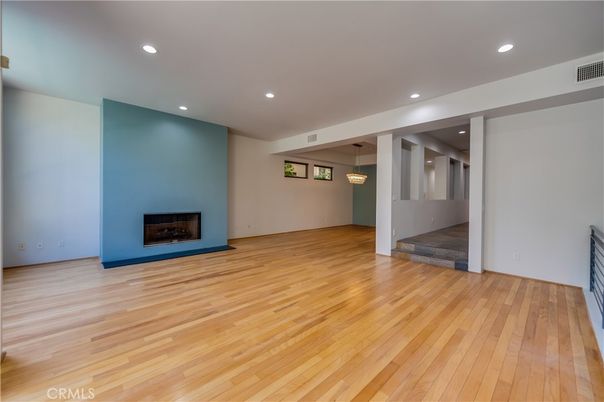 Empty room, Fireplace, Interior, Pendant Lights, Recessed Lighting, Wood Texture Flooring