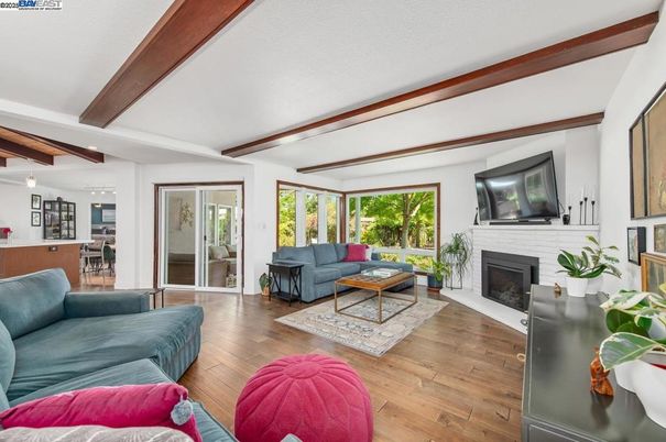 Fireplace, Interior, Living room, Pendant Lights, Recessed Lighting, Wooden Beams, Wood Texture Flooring