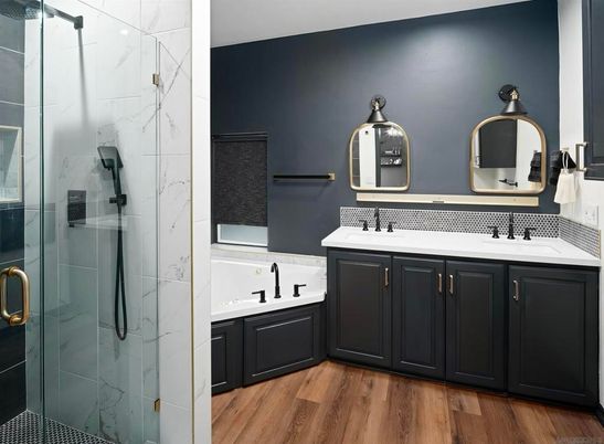 Bathroom, Dual Sink Vanities, Glass Shower, Interior, Marble Walls, Wood Texture Flooring