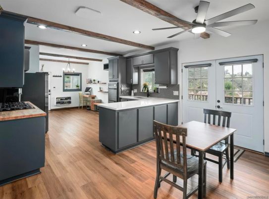 Dining room, Interior, Kitchen, Pendant Lights, Recessed Lighting, Stainless Steel Appliances, Wooden Beams, Wood Texture Flooring