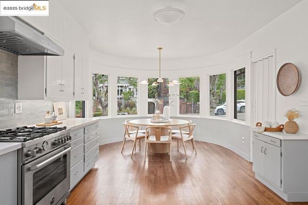 Dining room, Interior, Kitchen, Pendant Lights, Stainless Steel Appliances, Wood Texture Flooring