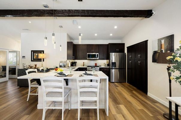 Dining room, Interior, Kitchen, Pendant Lights, Recessed Lighting, Stainless Steel Appliances, Wood Texture Flooring