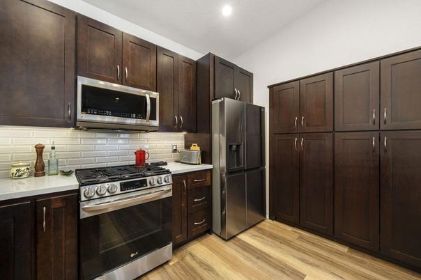 Interior, Kitchen, Recessed Lighting, Stainless Steel Appliances, Wood Texture Flooring