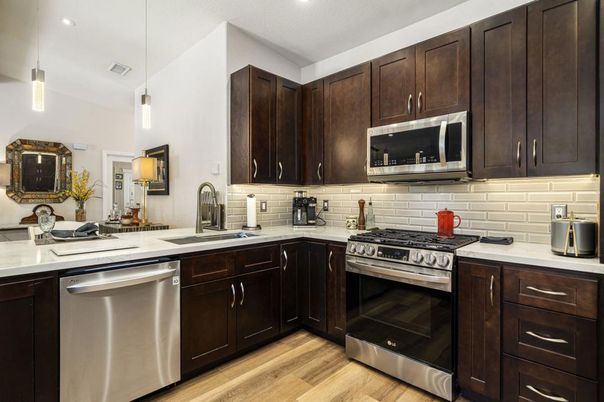 Interior, Kitchen, Pendant Lights, Recessed Lighting, Stainless Steel Appliances, Wood Texture Flooring