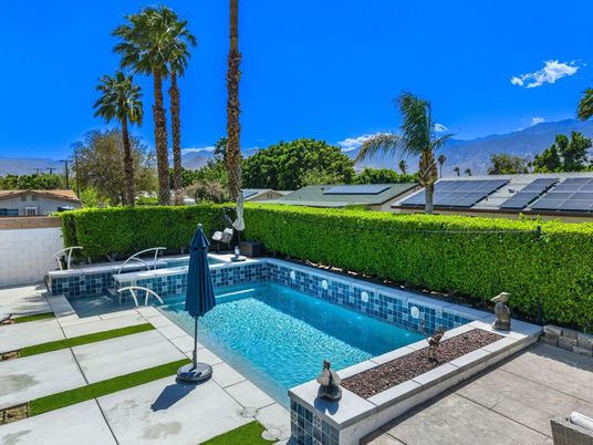 Exterior, Pool, Solar Panels