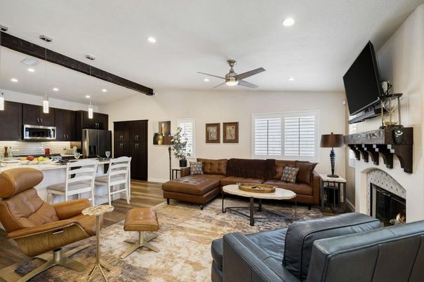 Dining room, Fireplace, Interior, Kitchen, Living room, Pendant Lights, Recessed Lighting, Stainless Steel Appliances, Wooden Beams, Wood Texture Flooring