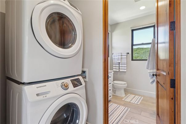 Bathroom, Interior, Recessed Lighting, Utility Closets, Washer, Wood Texture Flooring