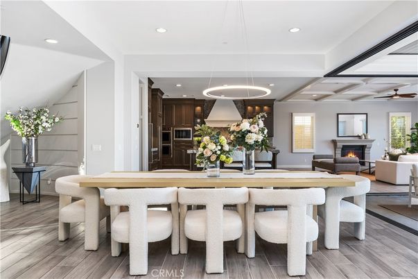 Dining room, Fireplace, Interior, Kitchen, Living room, Pendant Lights, Recessed Lighting, Stainless Steel Appliances, Wood Texture Flooring