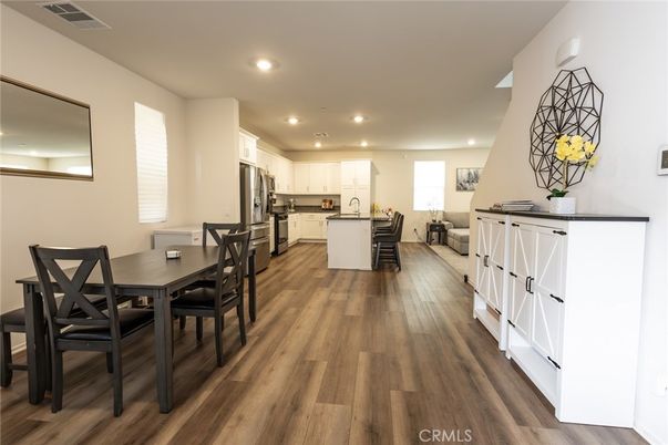 Dining room, Interior, Kitchen, Recessed Lighting, Stainless Steel Appliances, Wood Texture Flooring