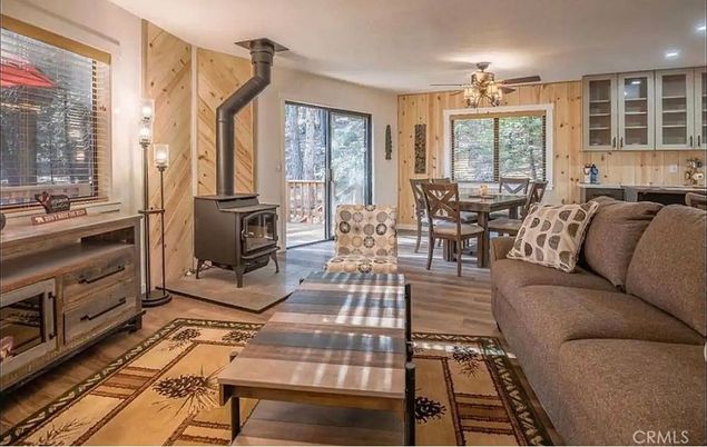 Dining room, Fireplace, Interior, Living room, Recessed Lighting, Wood Texture Flooring, Wooden Walls