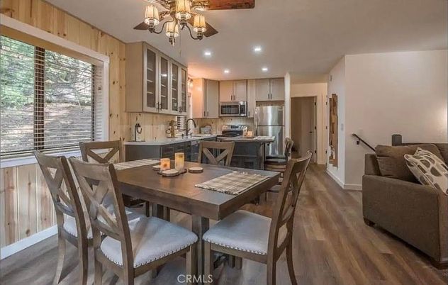 Chandelier, Dining room, Interior, Kitchen, Recessed Lighting, Stainless Steel Appliances, Wood Texture Flooring