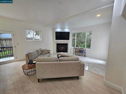 Fireplace, Interior, Living room, Marble, Recessed Lighting, Wood Texture Flooring