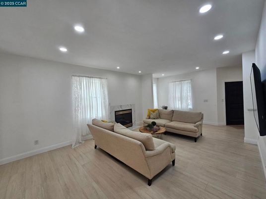 Fireplace, Interior, Living room, Recessed Lighting, Wood Texture Flooring
