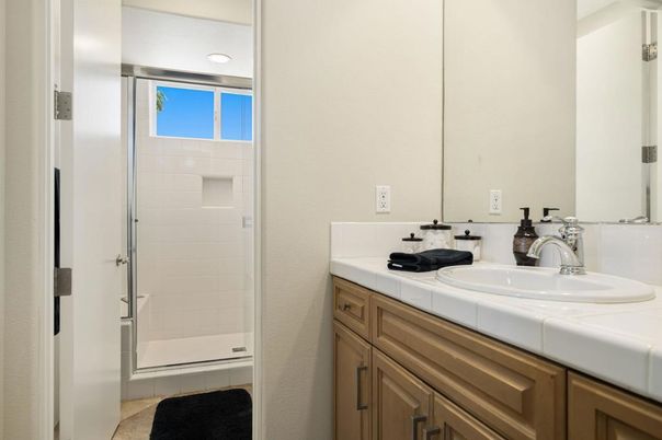 Bathroom, Dual Sink Vanities, Glass Shower, Interior, Recessed Lighting, Tile Countertops