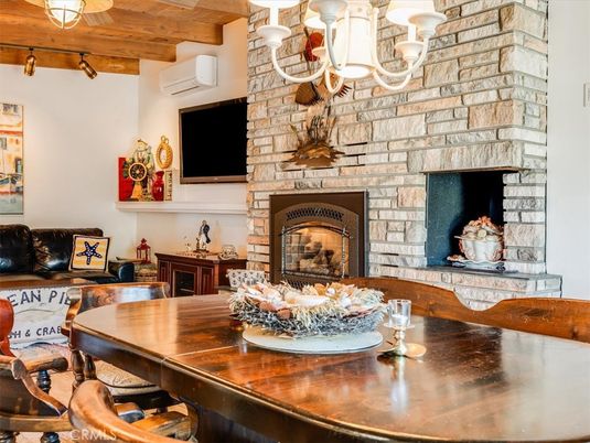 Chandelier, Dining room, Fireplace, Interior, Stone Walls