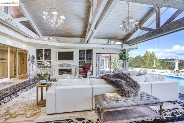 Chandelier, Fireplace, Interior, Living room, Wooden Ceilings