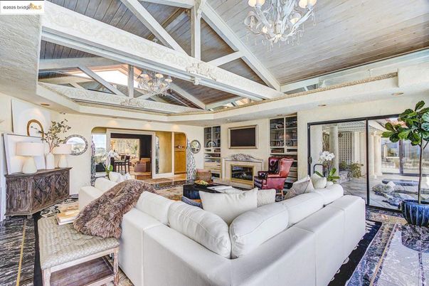 Chandelier, Fireplace, Interior, Living room, Recessed Lighting, Wooden Ceilings