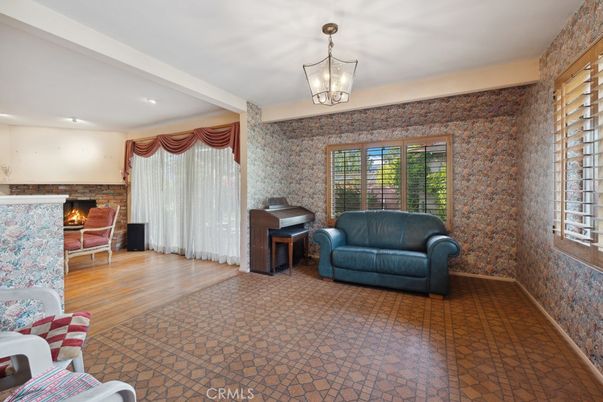 Fireplace, Interior, Living room, Piano, Recessed Lighting, Wood Texture Flooring