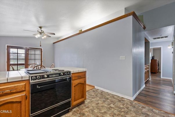 Interior, Kitchen, Tile Countertops, Wood Texture Flooring
