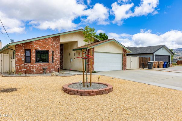 Attached, Backyard, Exterior, Facade, Brick Facade, Ranch