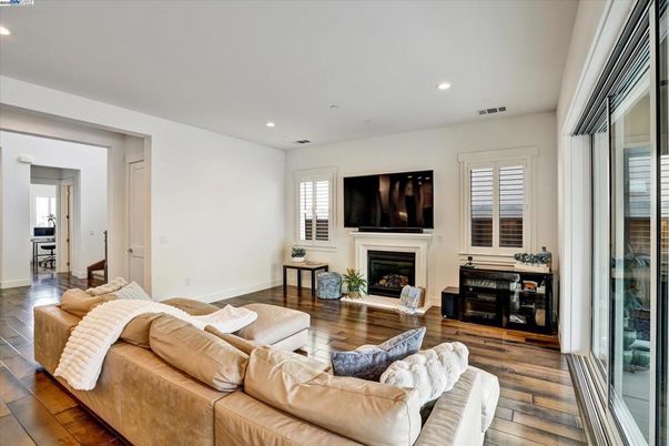 Fireplace, Interior, Living room, Recessed Lighting, Wood Texture Flooring