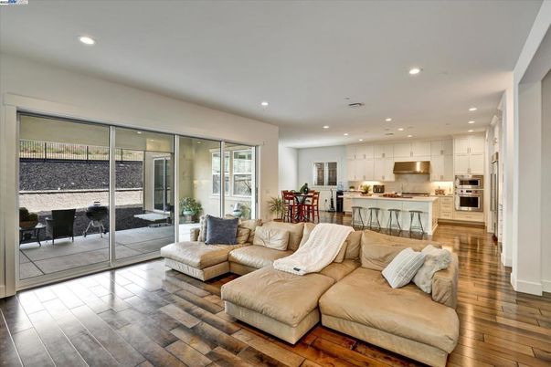 Dining room, Interior, Kitchen, Living room, Recessed Lighting, Stainless Steel Appliances, Wood Texture Flooring