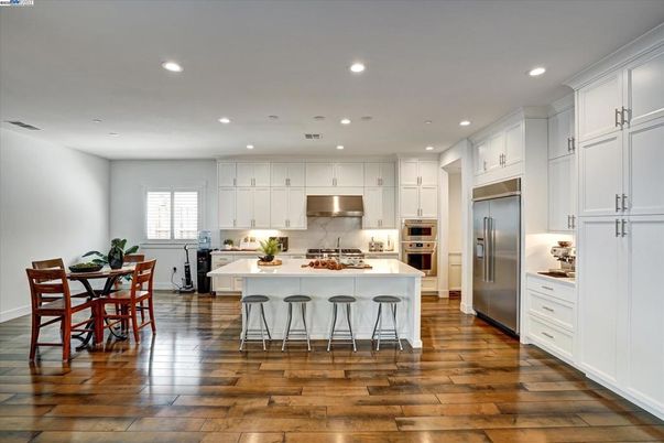 Dining room, Interior, Kitchen, Recessed Lighting, Stainless Steel Appliances, Wood Texture Flooring