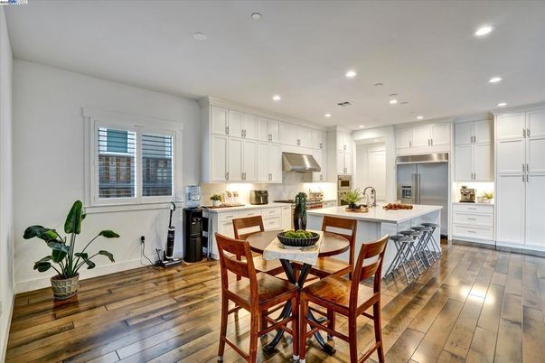 Dining room, Interior, Kitchen, Recessed Lighting, Stainless Steel Appliances, Wood Texture Flooring