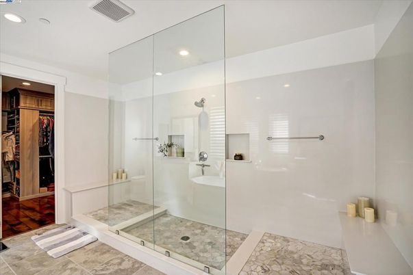 Bathroom, Glass Shower, Interior, Recessed Lighting, Walk-in Closets, Wood Texture Flooring