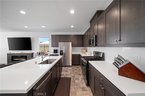 Fireplace, Interior, Kitchen, Recessed Lighting, Stainless Steel Appliances