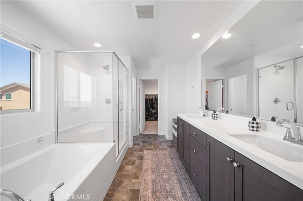 Bathroom, Dual Sink Vanities, Glass Shower, Interior, Recessed Lighting, Wood Texture Flooring