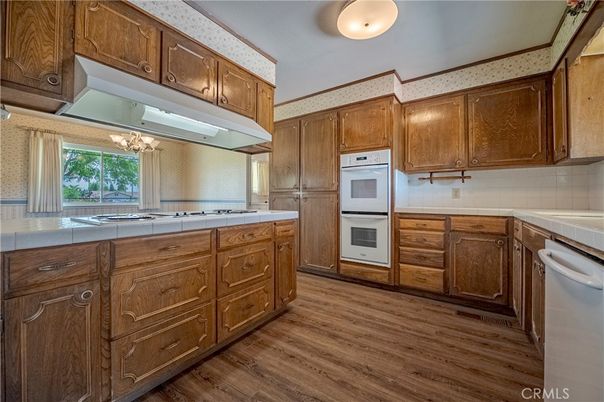 Interior, Kitchen, Tile Countertops, Wood Texture Flooring