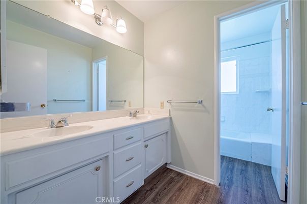 Bathroom, Dual Sink Vanities, Glass Shower, Interior, Wood Texture Flooring