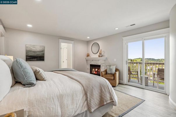 Bedroom, Fireplace, Interior, Recessed Lighting, Wood Texture Flooring