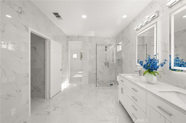 Bathroom, Dual Sink Vanities, Glass Shower, Interior, Marble, Marble Walls, Recessed Lighting