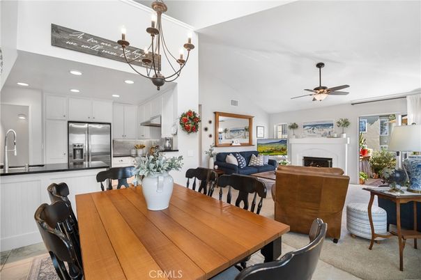 Chandelier, Dining room, Fireplace, Interior, Kitchen, Living room, Recessed Lighting, Stainless Steel Appliances