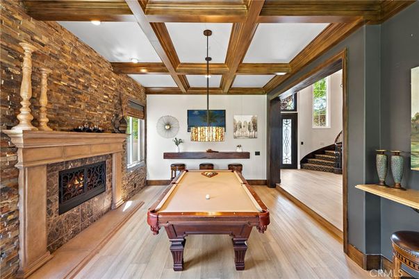 Billiard Table, Fireplace, Game Room, Interior, Pendant Lights, Recessed Lighting, Stone Walls, Wooden Beams, Wood Texture Flooring