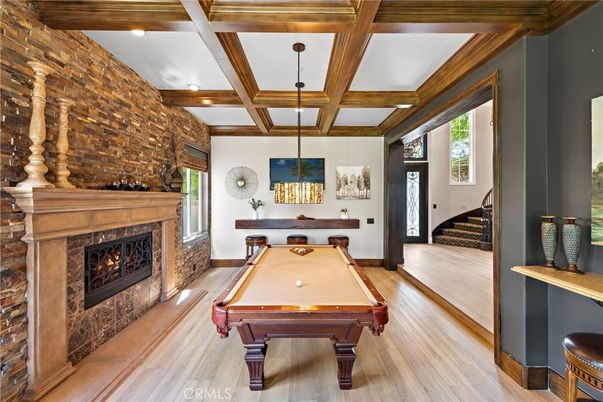Billiard Table, Fireplace, Game Room, Interior, Pendant Lights, Recessed Lighting, Stone Walls, Wooden Beams, Wood Texture Flooring
