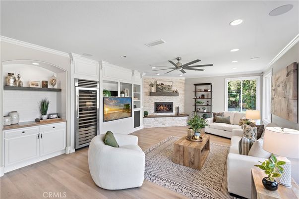 Fireplace, Interior, Living room, Recessed Lighting, Stone Walls, Wood Texture Flooring