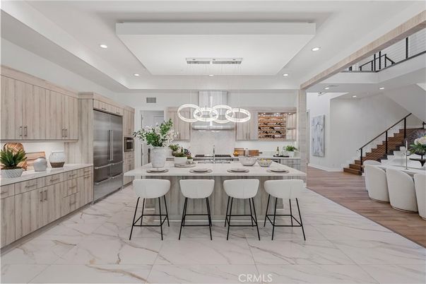 Chandelier, Interior, Kitchen, Marble, Pendant Lights, Recessed Lighting, Stainless Steel Appliances, Wood Texture Flooring