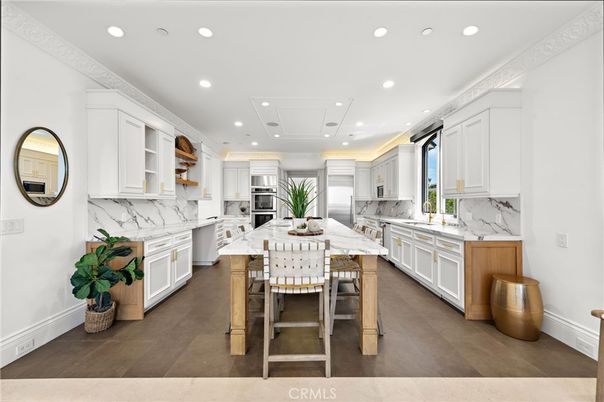 Interior, Kitchen, Marble Walls, Recessed Lighting, Stainless Steel Appliances